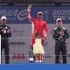 TOKYO, JAPAN - MAY 18: Race winner Oliver Rowland of Great Britain and Nissan Formula E Team celebrates on the podium with his daughter, Second placed Pascal Wehrlein of Germany and TAG Heuer Porsche Formula E Team and Third placed Dan Ticktum of Great Britain and CUPRA KIRO during the Tokyo E-Prix, Round 9 of the 2025 FIA Formula E World Championship at Tokyo Street Circuit on May 18, 2025 in Tokyo, Japan. (Photo by Andrew Ferraro/LAT Images)