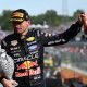 BUDAPEST, HUNGARY - JULY 26: Second placed Max Verstappen of the Netherlands and Oracle Red Bull Racing leaves the podium with his trophy and Champagne during the F1 Grand Prix of Hungary at Hungaroring on July 26, 2026 in Budapest, Hungary. (Photo by Sam Bagnall/Sutton Images)